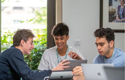 Children exploring academic activities at a UK summer school